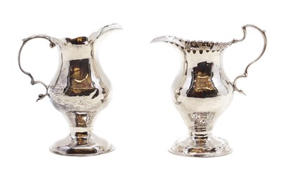 Lot 23 - A George III silver cream jug