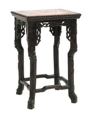 Lot 496 - A Chinese hardwood and marble urn stand