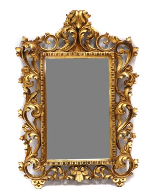 Lot 466 - A carved giltwood mirror in the Florentine-style