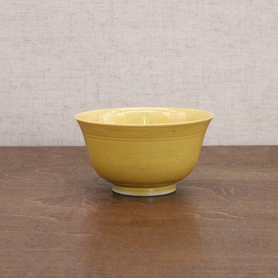 Lot 65 - A Chinese yellow-glazed bowl