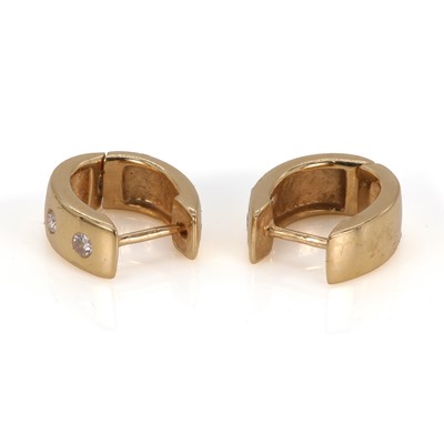 Lot 58 - A pair of 18ct gold diamond cuff earrings, retailed by Susanna Lovis