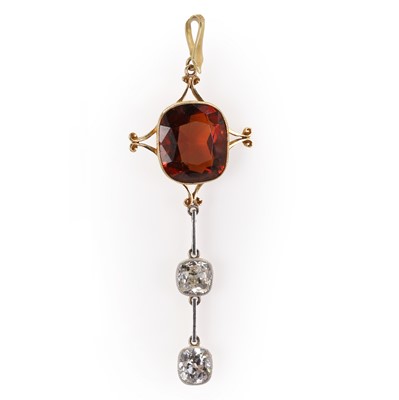 Lot 38 - An Edwardian hessonite garnet and diamond pendant