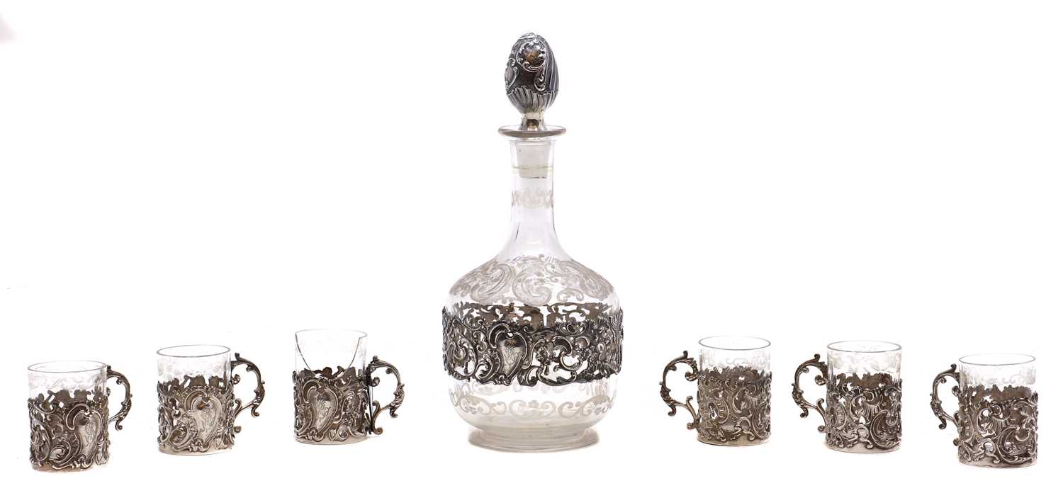 Lot 7 - A glass and silver mounted decanter