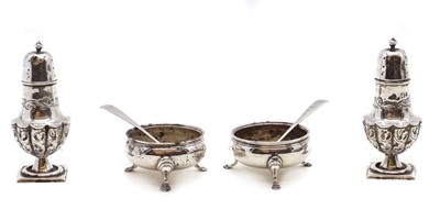 Lot 16 - A pair of silver pepperettes