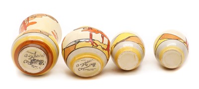 Lot 213 - A set of four Clarice Cliff miniature vases