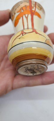 Lot 213 - A set of four Clarice Cliff miniature vases