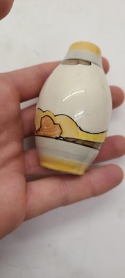 Lot 213 - A set of four Clarice Cliff miniature vases