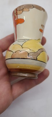 Lot 213 - A set of four Clarice Cliff miniature vases