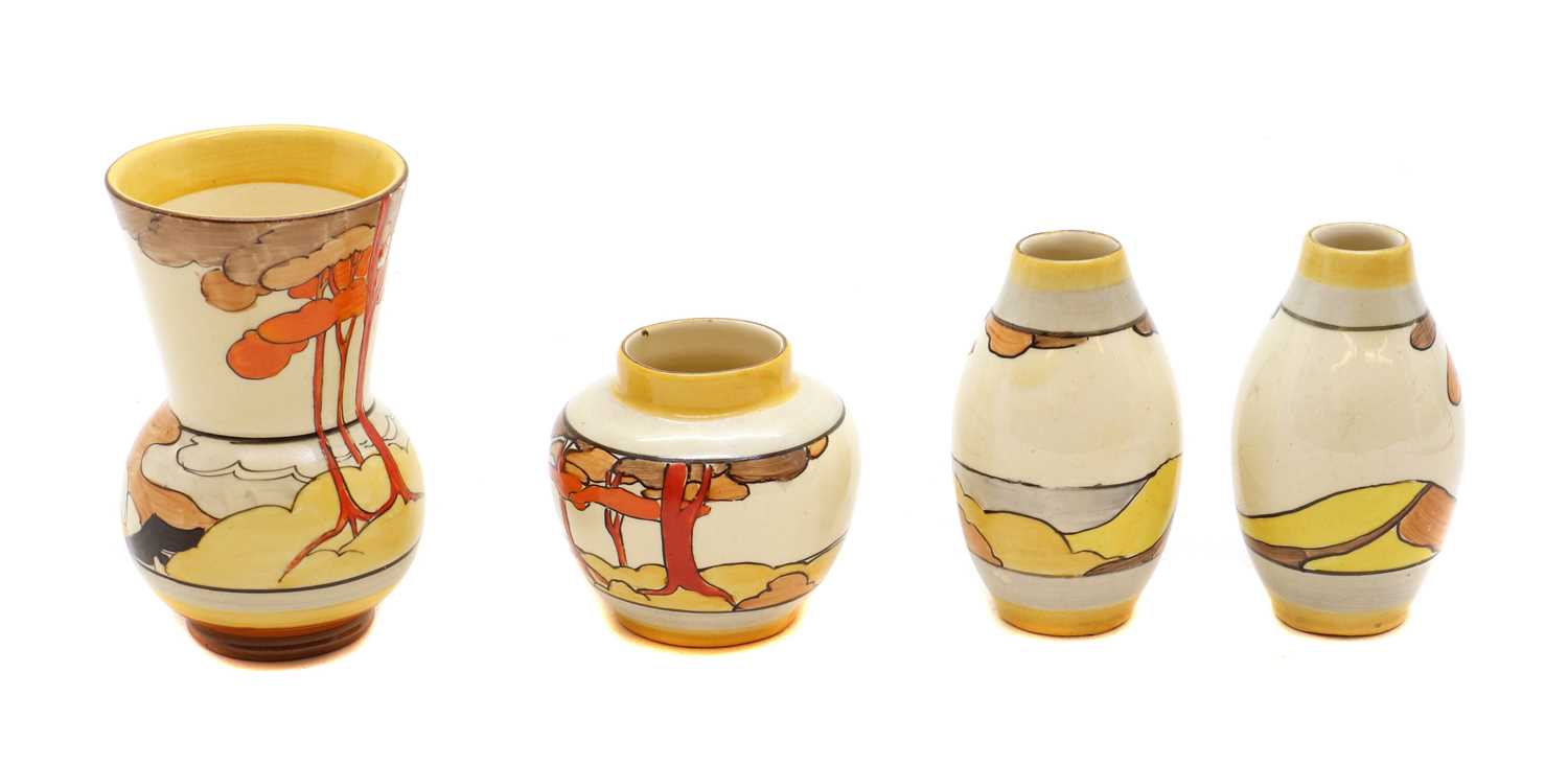 Lot 213 - A set of four Clarice Cliff miniature vases