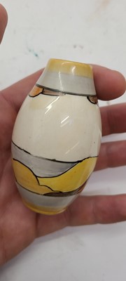Lot 213 - A set of four Clarice Cliff miniature vases