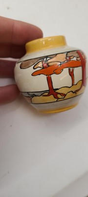 Lot 213 - A set of four Clarice Cliff miniature vases