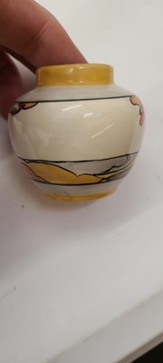 Lot 213 - A set of four Clarice Cliff miniature vases