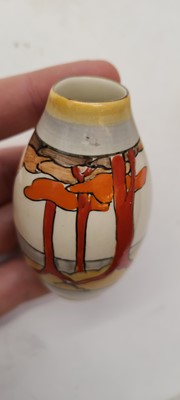 Lot 213 - A set of four Clarice Cliff miniature vases