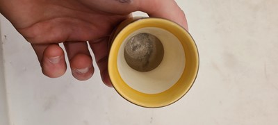 Lot 213 - A set of four Clarice Cliff miniature vases