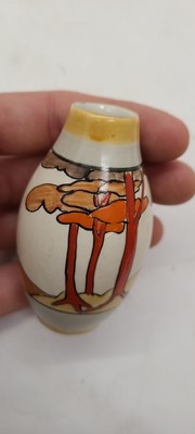 Lot 213 - A set of four Clarice Cliff miniature vases