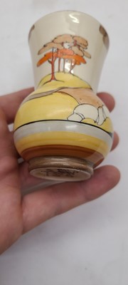 Lot 213 - A set of four Clarice Cliff miniature vases