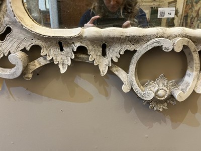 Lot 59 - A pair of George III-style painted wooden mirrors