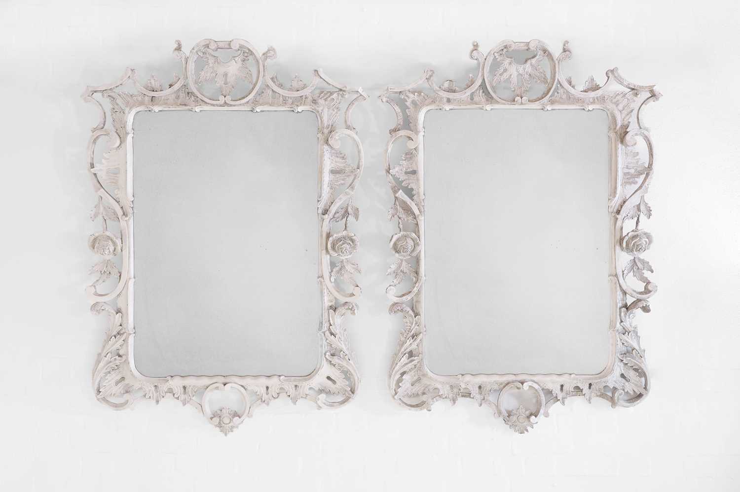 Lot 59 - A pair of George III-style painted wooden mirrors