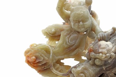 Lot 153 - A large Chinese soapstone carving