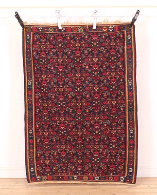 Lot 411 - A Sennah kilim rug