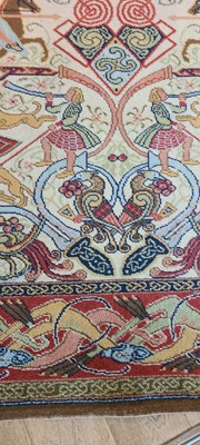 Lot 103 - A machine-woven carpet