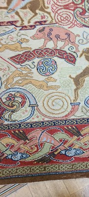 Lot 103 - A machine-woven carpet