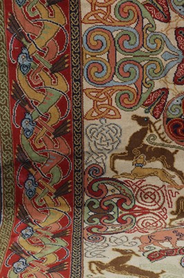 Lot 103 - A machine-woven carpet