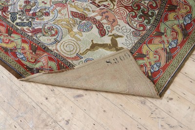 Lot 103 - A machine-woven carpet