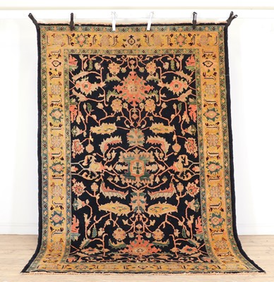 Lot 408 - A wool carpet