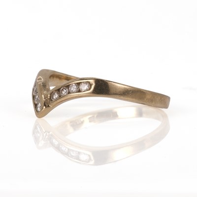 Lot 47 - A 9ct gold and diamond wishbone ring