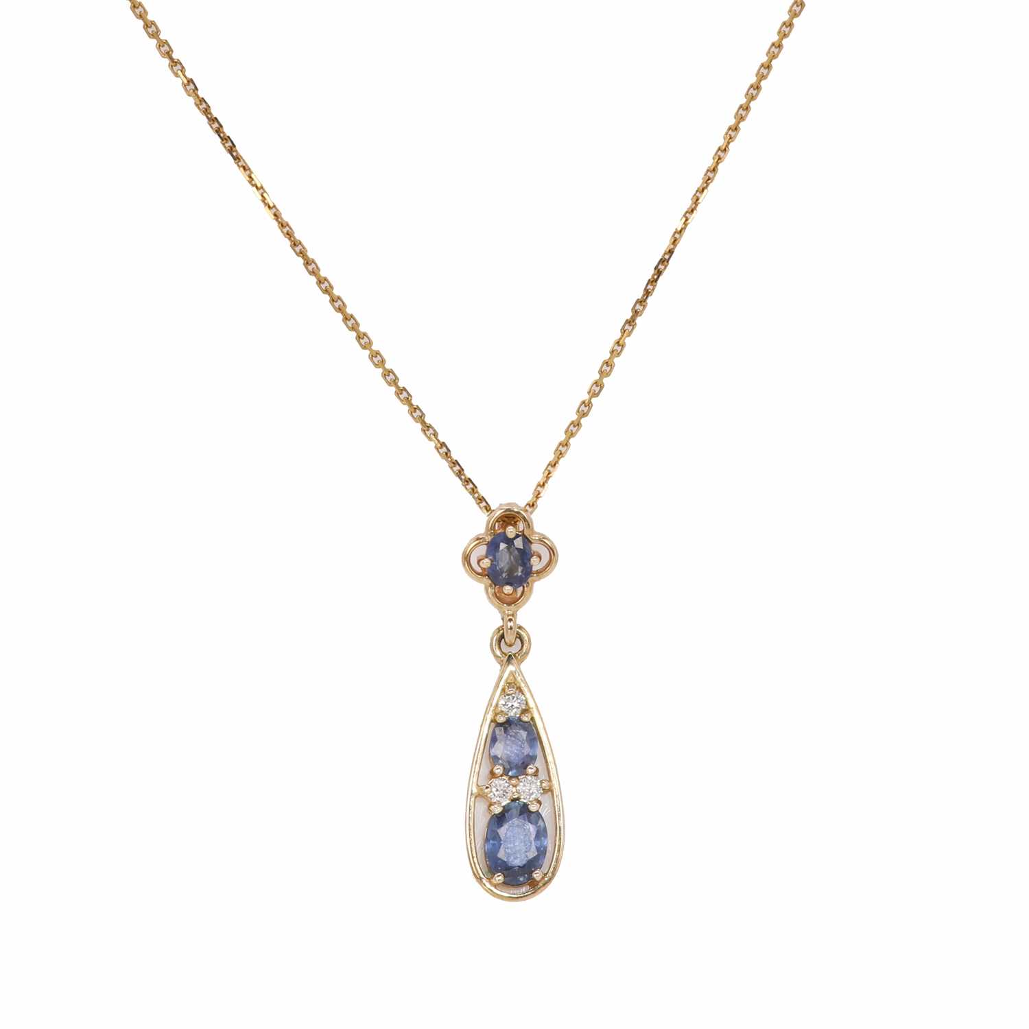 Lot 105 - A 9ct gold sapphire and diamond drop pendant with chain