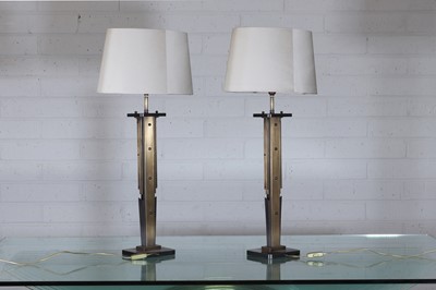 Lot 130 - A pair of Art Deco-style bronze and brass table lamps