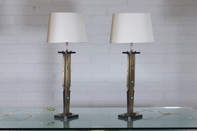 Lot 130 - A pair of Art Deco-style bronze and brass table lamps