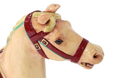 Lot 44 - A carved wooden fairground carousel juvenile 'Dobby' horse attributed to F Heyn