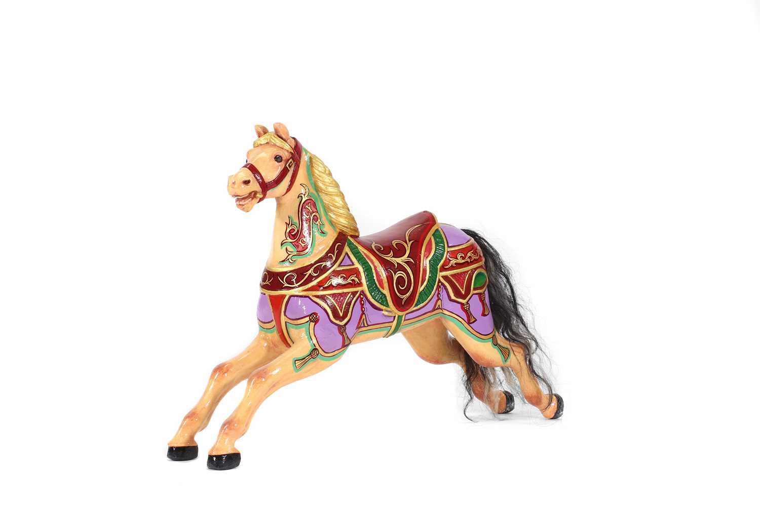 Lot 44 - A carved wooden fairground carousel juvenile 'Dobby' horse attributed to F Heyn