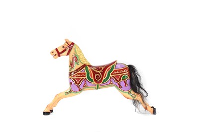 Lot 44 - A carved wooden fairground carousel juvenile 'Dobby' horse attributed to F Heyn