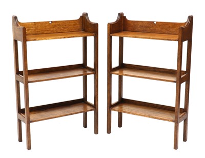 Lot 499 - A pair of Liberty style oak bookcases