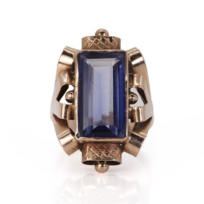Lot 19 - A rose gold synthetic sapphire ring, c.1940