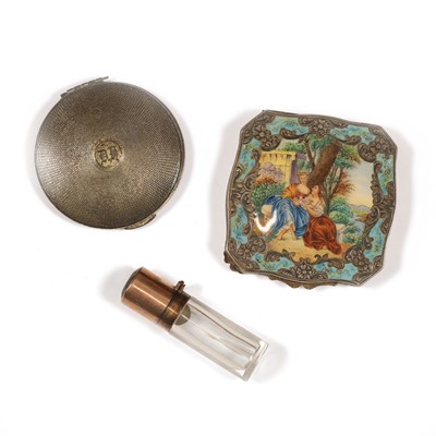 Lot 245 - A vintage enamel powder compact, a silver one by KIGU and a citrine topped scent bottle