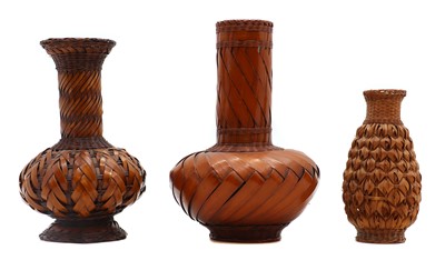 Lot 177 - A small group of Japanese woven ikebana vases