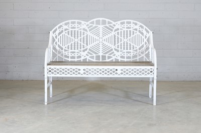 Lot 180 - A cast iron garden bench