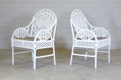 Lot 181 - A pair of cast iron garden chairs