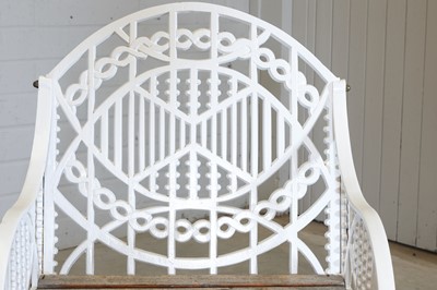 Lot 181 - A pair of cast iron garden chairs