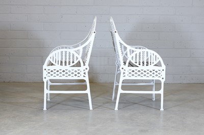 Lot 181 - A pair of cast iron garden chairs