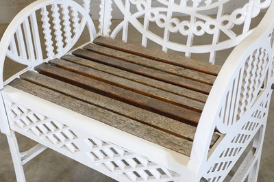 Lot 181 - A pair of cast iron garden chairs