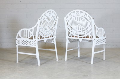 Lot 181 - A pair of cast iron garden chairs