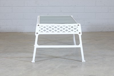 Lot 182 - A cast iron garden table