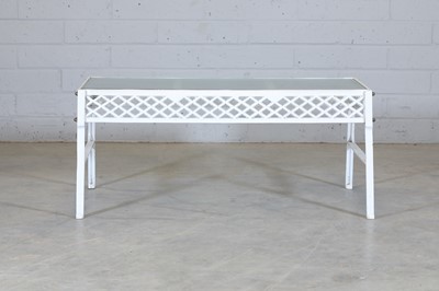 Lot 182 - A cast iron garden table