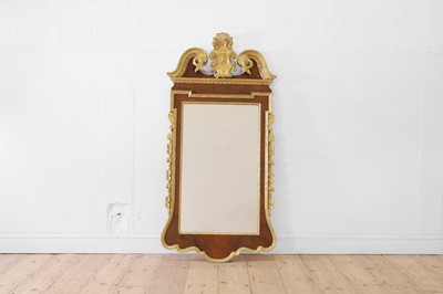 Lot 283 - A George II walnut and parcel-gilt pier mirror