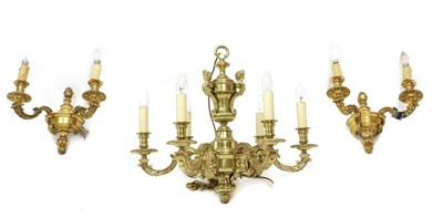 Lot 426 - A brass six-light chandelier